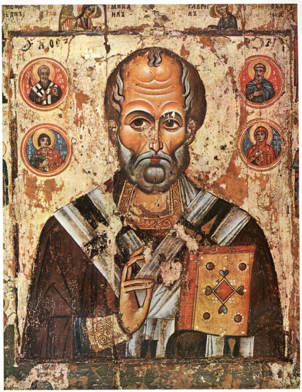 Русская икона "Никола Чудотворец". Середина XIII века. Правая рука поднята в двуперстном крестном знамении. Русская икона "Никола Чудотворец". Середина XIII века. Правая рука поднята в двуперстном крестном знамении.
